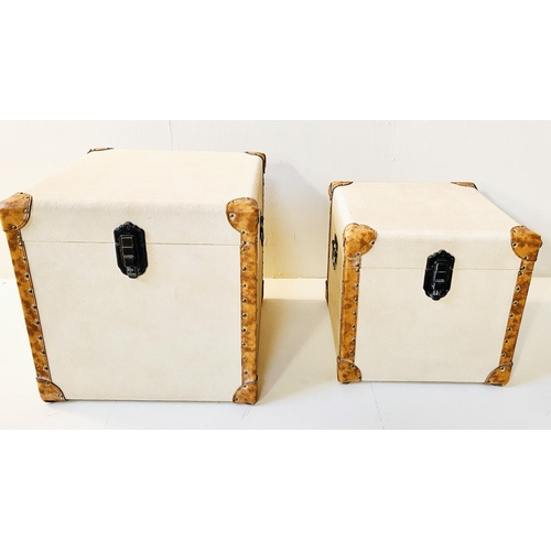 332 - TRUNKS, graduated set of two, canvas and leather, largest 50cm H x 50cm W x 50cm D. (2)