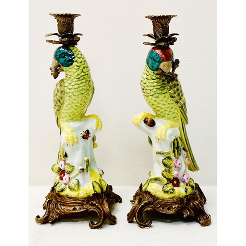 335 - PARROT CANDLESTICKS, a pair, painted ceramic and gilt metal. (2)