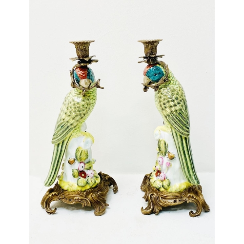 335 - PARROT CANDLESTICKS, a pair, painted ceramic and gilt metal. (2)