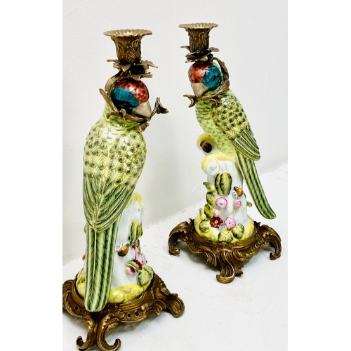 335 - PARROT CANDLESTICKS, a pair, painted ceramic and gilt metal. (2)