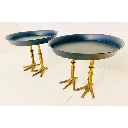 326 - TAZZAS, a pair, black metal dishes on gilt birds feet supports, 31cm H x 41cm W x 41cm D. (2)