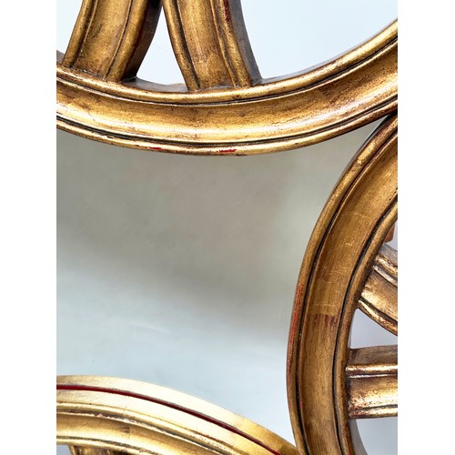 128 - WALL MIRROR, contemporary gilt in the manner of Harrison & Gil, with central mirror plate and concen... 