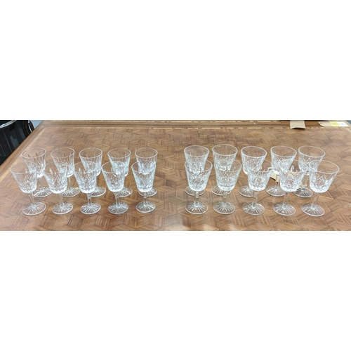 14 - WATERFORD 'LISMORE', set of ten port glasses, and a matching set of ten sherry glasses, faceted stem... 