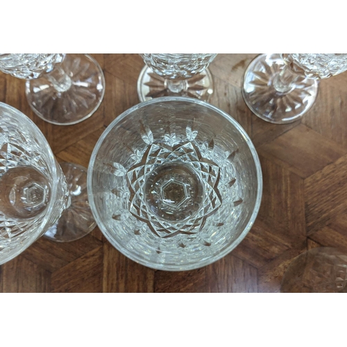 14 - WATERFORD 'LISMORE', set of ten port glasses, and a matching set of ten sherry glasses, faceted stem... 