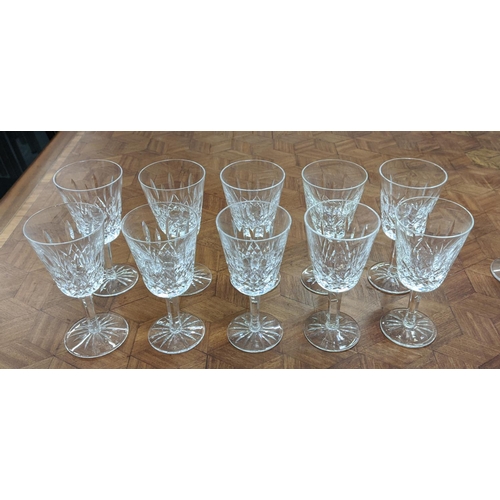 14 - WATERFORD 'LISMORE', set of ten port glasses, and a matching set of ten sherry glasses, faceted stem... 