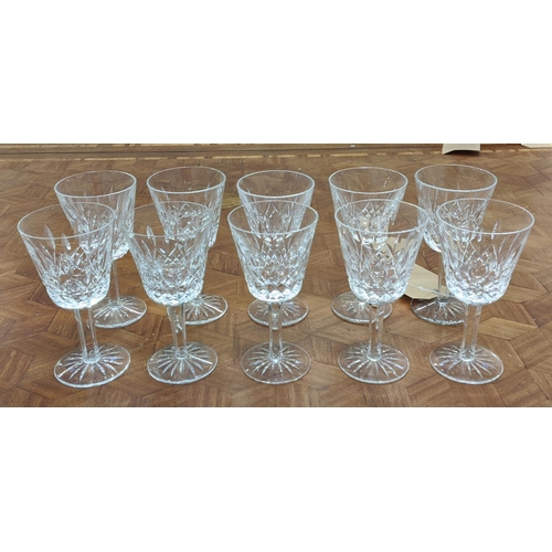 14 - WATERFORD 'LISMORE', set of ten port glasses, and a matching set of ten sherry glasses, faceted stem... 