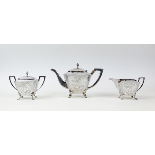 20A - A CHINESE SILVER THREE PIECE TEA SERVICE, early 20th century, comprising teapot, milk jug and lidded... 