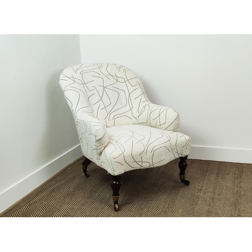 357 - ARMCHAIR, Victorian in patterned boucle wool on brass castors, 85cm H x 65cm W x 92cm D.