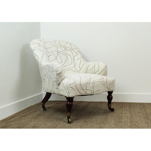 357 - ARMCHAIR, Victorian in patterned boucle wool on brass castors, 85cm H x 65cm W x 92cm D.