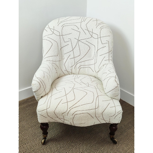 357 - ARMCHAIR, Victorian in patterned boucle wool on brass castors, 85cm H x 65cm W x 92cm D.