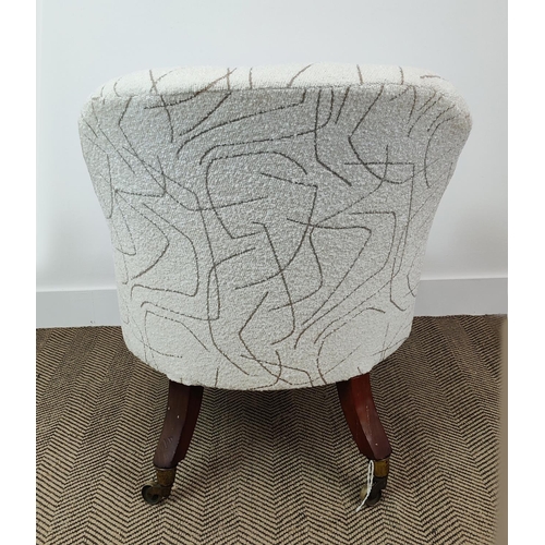 357 - ARMCHAIR, Victorian in patterned boucle wool on brass castors, 85cm H x 65cm W x 92cm D.