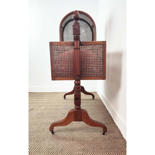 359 - CRADLE, George IV mahogany and caned with pine slatted base, check cushion and brass castors, 136cm ... 