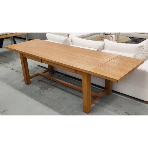 361 - LA CORNUE OAK TABLE, extendable with two leaves, has drawer and pull out loose chopping board to one... 