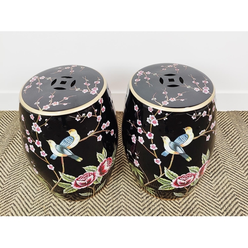 374 - BARREL STOOLS, a pair, bird and foliage decoration, 45cm H x 30cm W. (2)