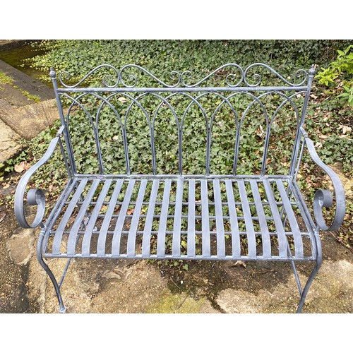 403 - GARDEN BENCH, light grey painted wrought metal, 92cm H x 107cm W x 54cm D.