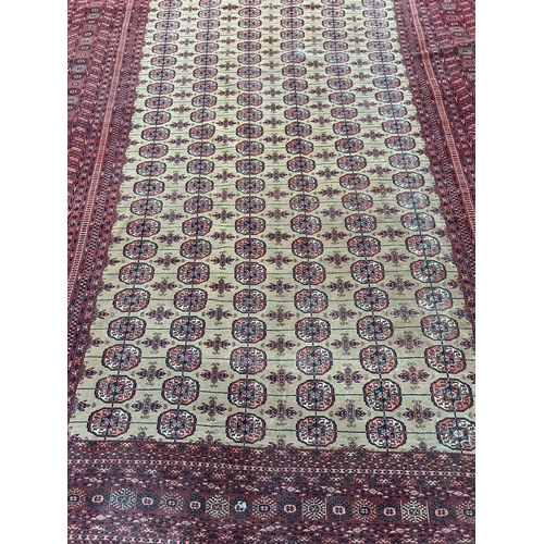 150 - FINE SIGNED TURKMAN CARPET, 331cm x 253cm, Islamic date 