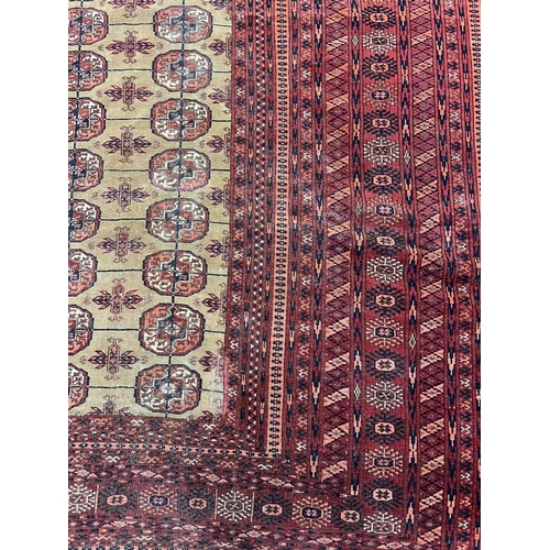 150 - FINE SIGNED TURKMAN CARPET, 331cm x 253cm, Islamic date 