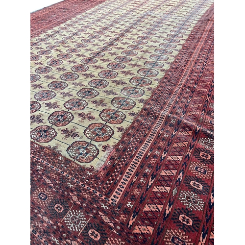 150 - FINE SIGNED TURKMAN CARPET, 331cm x 253cm, Islamic date 