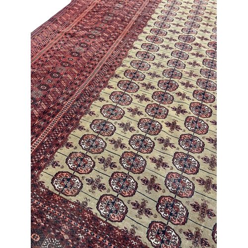 150 - FINE SIGNED TURKMAN CARPET, 331cm x 253cm, Islamic date 