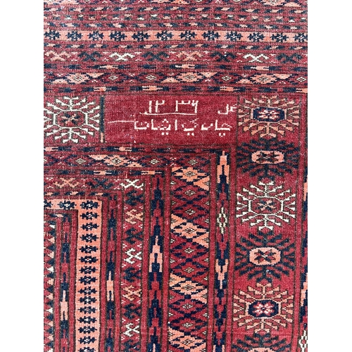 150 - FINE SIGNED TURKMAN CARPET, 331cm x 253cm, Islamic date 