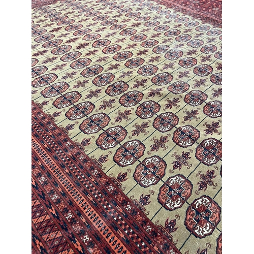 150 - FINE SIGNED TURKMAN CARPET, 331cm x 253cm, Islamic date 