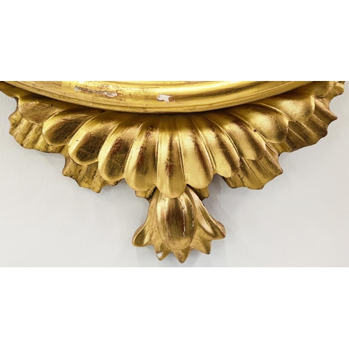 369 - CONVEX MIRROR, Regency, with eagle surmount, 82cm H x 56cm W.