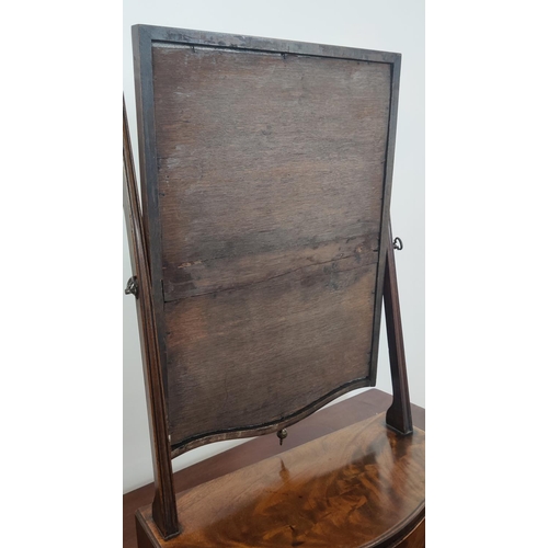 373 - TOILET MIRROR, with a tilting glass plate and serpentine base with three drawers, 65cm H x 46cm W an... 