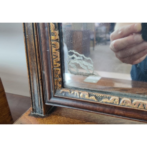 373 - TOILET MIRROR, with a tilting glass plate and serpentine base with three drawers, 65cm H x 46cm W an... 