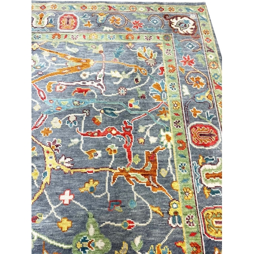 140 - FINE GAROUS DESIGN CARPET,  342cm x 248cm.