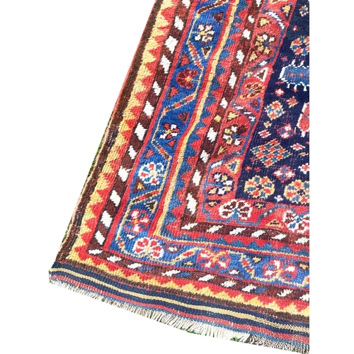 142 - ANTIQUE NORTH WEST PERSIAN BAKTIARI CORRIDOR CARPET, 365cm x 150cm.