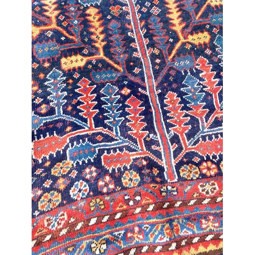 142 - ANTIQUE NORTH WEST PERSIAN BAKTIARI CORRIDOR CARPET, 365cm x 150cm.