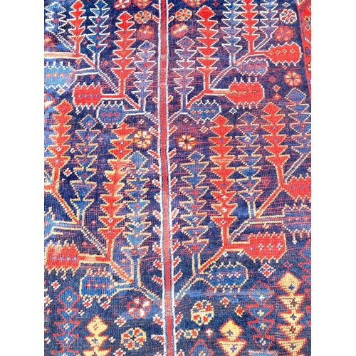 142 - ANTIQUE NORTH WEST PERSIAN BAKTIARI CORRIDOR CARPET, 365cm x 150cm.