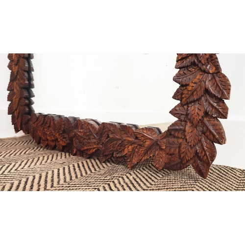 156 - WALL MIRROR, hand-carved with scrolling grapevines, 162cm H x 74cm W.