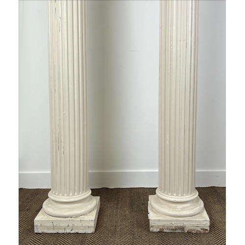 159 - ARCHITECTURAL COLUMNS, a pair, painted plaster with ionic capitals, 207cm H. (2)