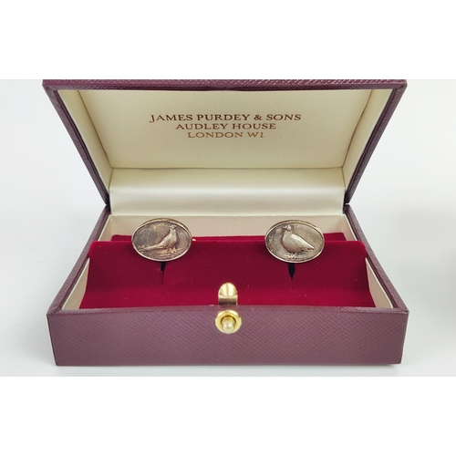 19 - CUFFLINKS, three pairs, including Gucci and Tiffany and a Christofle champagne stopper.