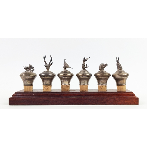 2 - SILVER STOPPERS, a collection of six, hunting themed marked B and Co, 925, Sheffield on wooden stand... 