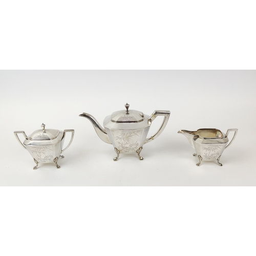 20A - A CHINESE SILVER THREE PIECE TEA SERVICE, early 20th century, comprising teapot, milk jug and lidded... 