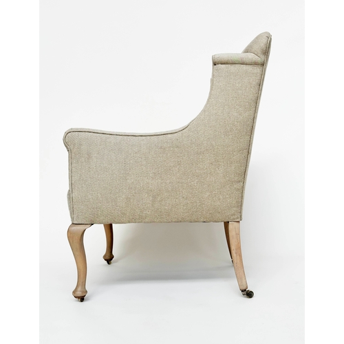 214 - WINGBACK ARMCHAIR, English early 20th century with natural linen upholstery and cabriole front suppo... 