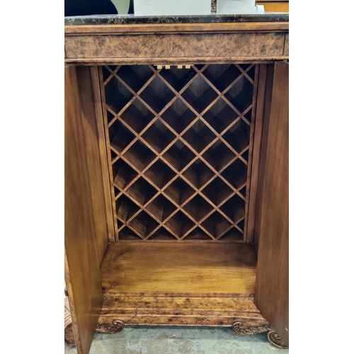 228 - ATTRIBUTED TO MAITLAND SMITH WINE CABINET, burr walnut with marble top with faux book spine fronted ... 