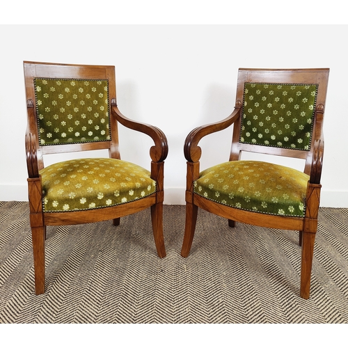 229 - FAUTEUILS, a pair, Restauration walnut, circa 1825, with old green plush upholstery, 57cm W x 56cm D... 