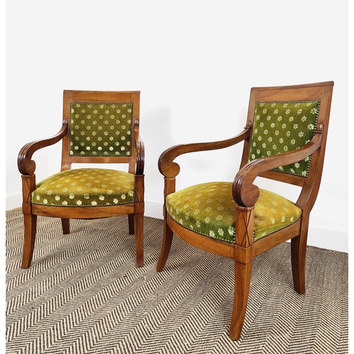 229 - FAUTEUILS, a pair, Restauration walnut, circa 1825, with old green plush upholstery, 57cm W x 56cm D... 