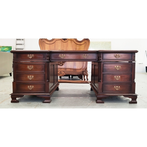 235 - PARTNER'S DESK, Georgian style mahogany with burgundy leather top above nine drawers, opposed by thr... 