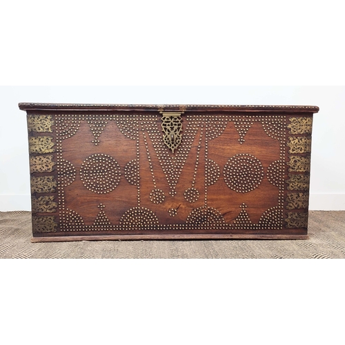 238 - ZANZIBAR TRUNK, teak with brass studded decoration, 63cm H x 130cm W x 63cm D.