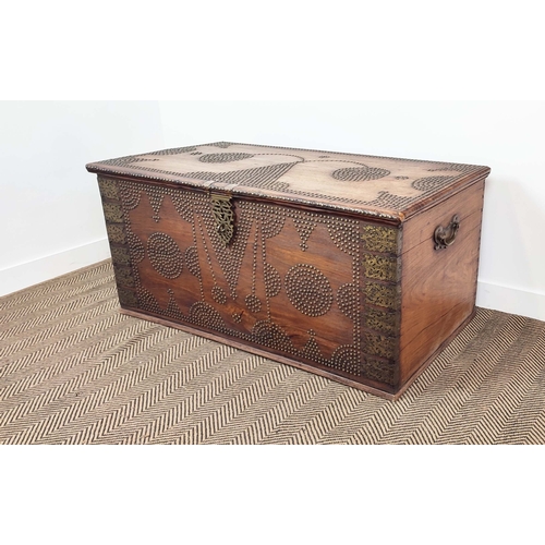 238 - ZANZIBAR TRUNK, teak with brass studded decoration, 63cm H x 130cm W x 63cm D.