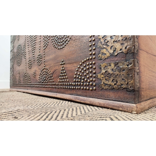 238 - ZANZIBAR TRUNK, teak with brass studded decoration, 63cm H x 130cm W x 63cm D.