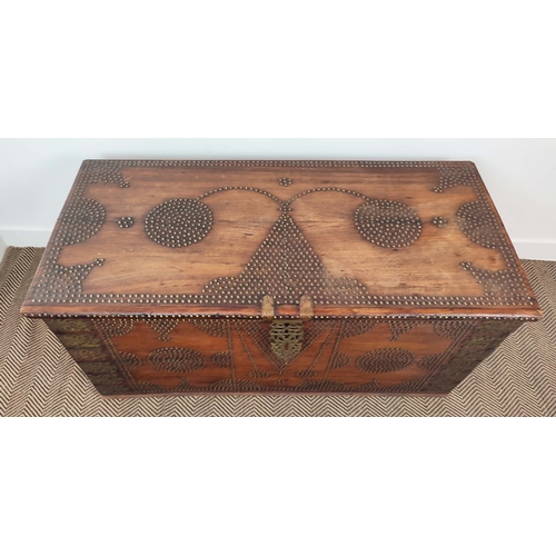 238 - ZANZIBAR TRUNK, teak with brass studded decoration, 63cm H x 130cm W x 63cm D.