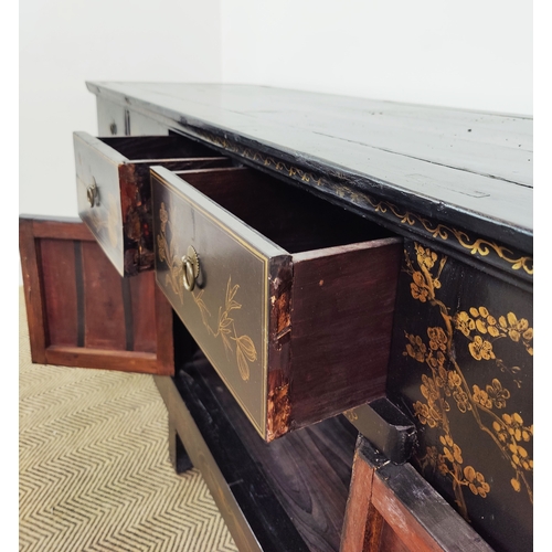 239 - CHINESE SIDEBOARD, black lacquered with ggilt decorated front, having four drawers over twin cupboar... 