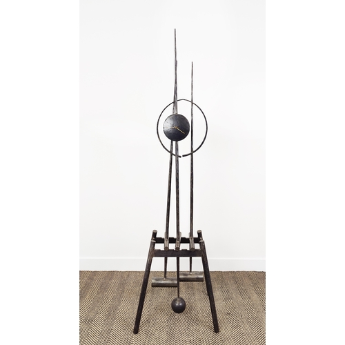 27 - PAUL MARGETTS, three pendulum clock, sculptured metal work, 186cm H.