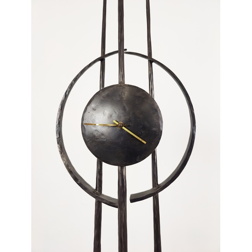 27 - PAUL MARGETTS, three pendulum clock, sculptured metal work, 186cm H.