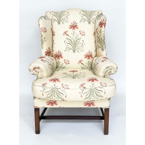 271 - WINGBACK ARMCHAIR, George III period mahogany with early English style printed linen upholstery, fea... 